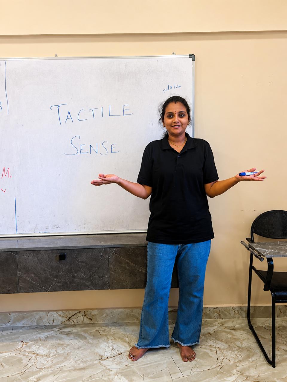 Student teacher explaining a Montessori sensorial activity in a classroom teaching practice session